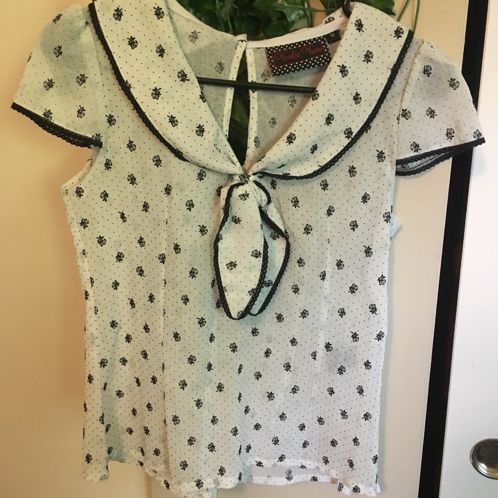 White Polka Dot Blouse with Black Accents